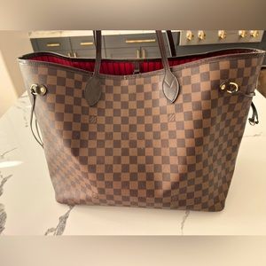 Louis Vuitton Authentic GM neverfull handbag. Used but lots of life left!